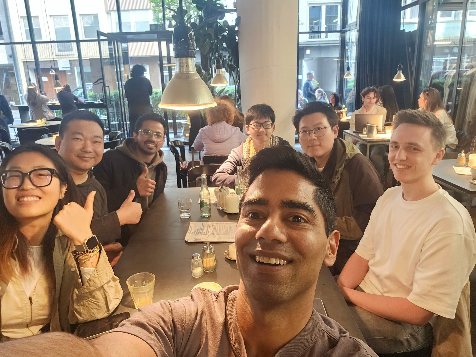 Yogesh Singh taking selfie with attendees at The UX Designers Circle.